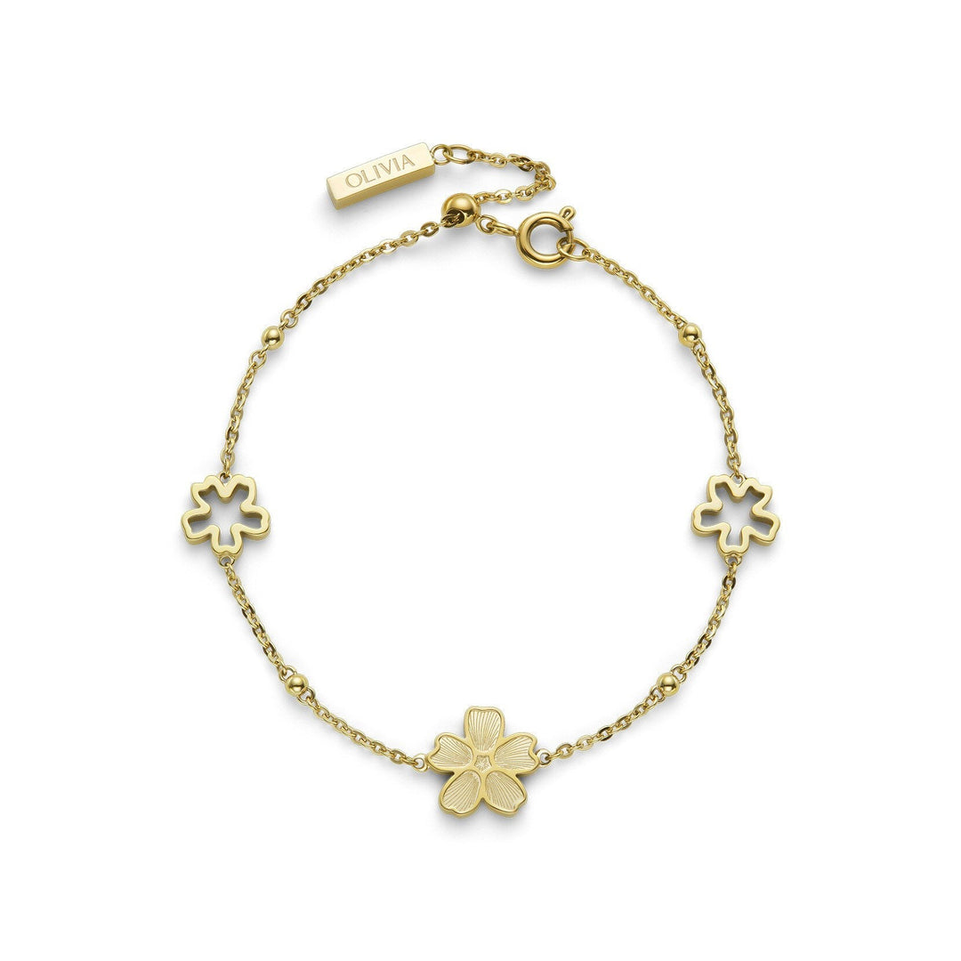 Niche Jewellery Olivia Burton gold-plated bracelet featuring delicate forget-me-not flower charms on a fine chain.