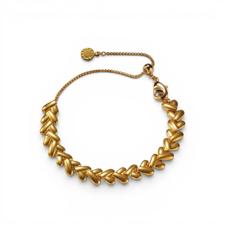 Niche Jewellery: Katie Loxton gold bracelet with interlocking heart links, adjustable chain, and lobster clasp. Waterproof 18K Gold PVD.