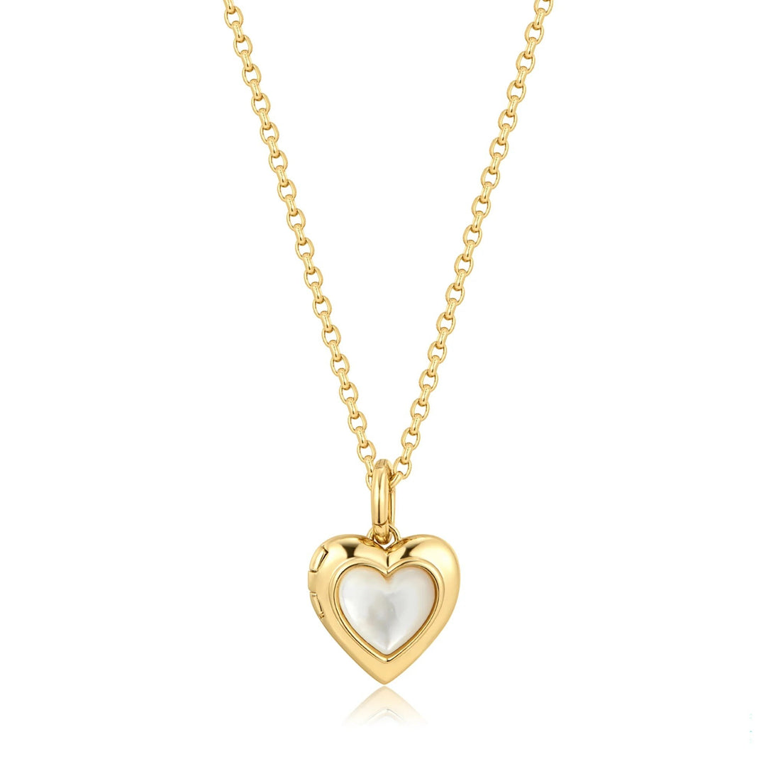 Niche Jewellery Ania Haie gold heart locket necklace with a mother of pearl inlay on a delicate chain.
