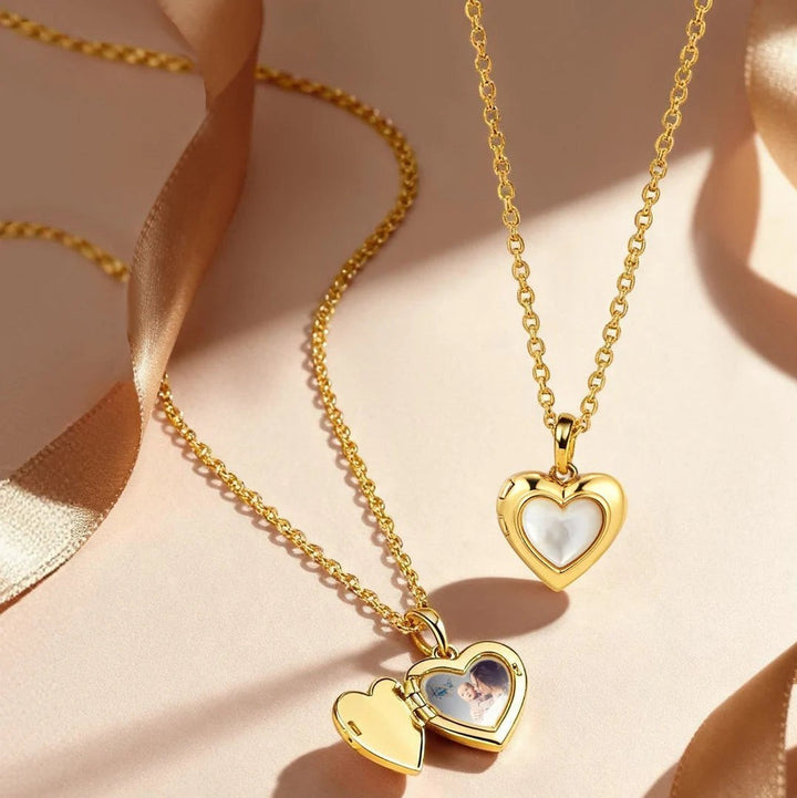Niche Jewellery Ania Haie gold heart locket necklace with mother of pearl inlay and open compartment for a photo.