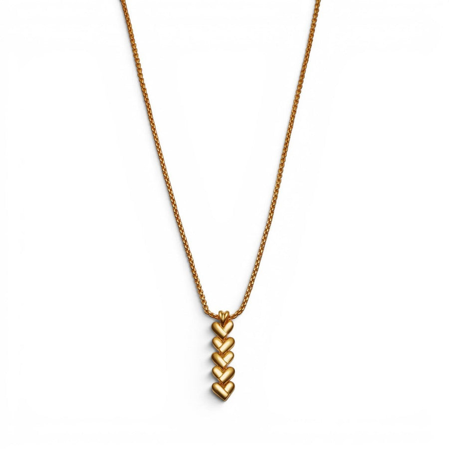 Niche Jewellery Katie Loxton gold necklace with a vertical row of five heart-shaped links on a delicate chain. Waterproof and sweat-proof.