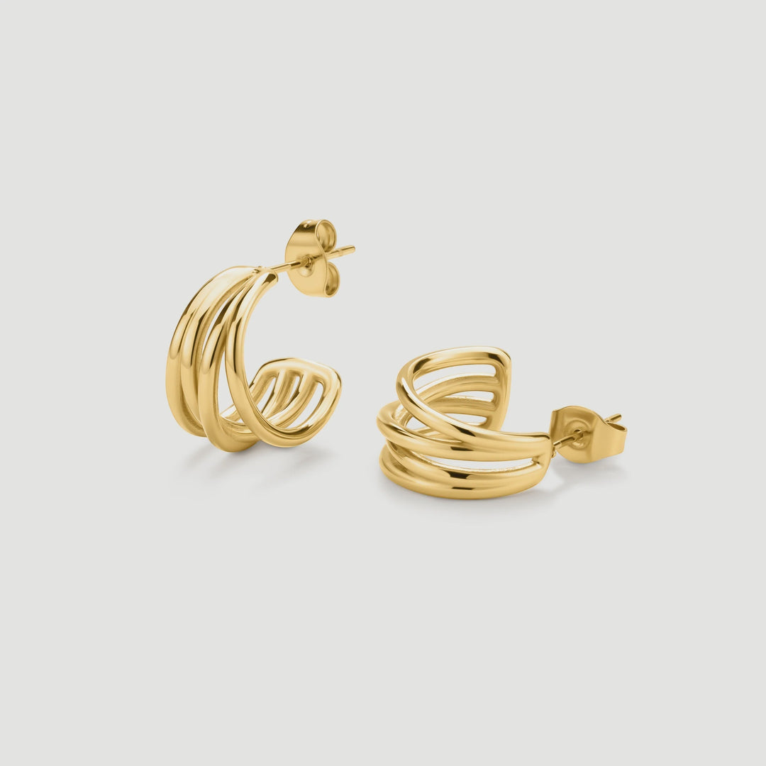 Niche Jewellery D.Louise gold intertwined mini hoop earrings in polished tarnish-free stainless steel.