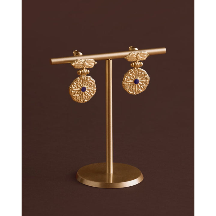 Niche Jewellery Katie Loxton gold-tone waterproof earrings featuring textured round discs and dark lapis lazuli stones.