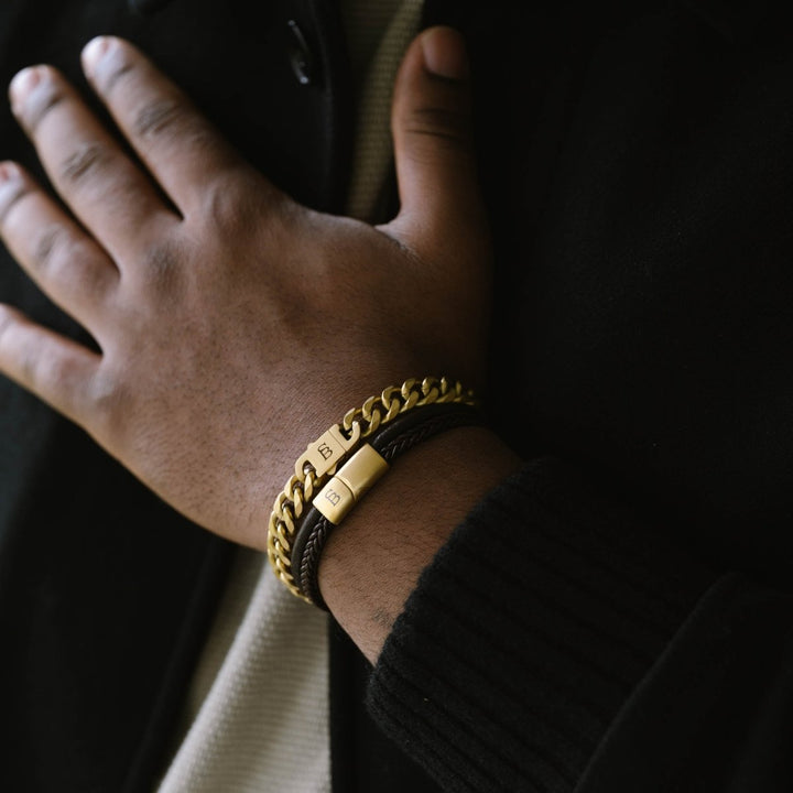 Niche Jewellery Steel & Barnett 18K gold plated stainless steel link chain bracelet worn on a man's wrist