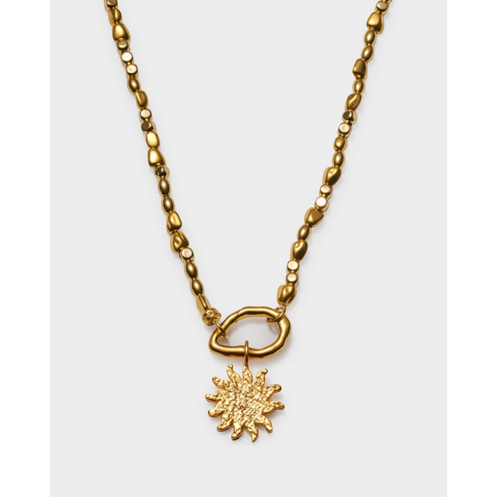 Niche Jewellery Golden Solesi waterproof gold necklace with sun pendant and textured beads. 18K gold PVD coating.