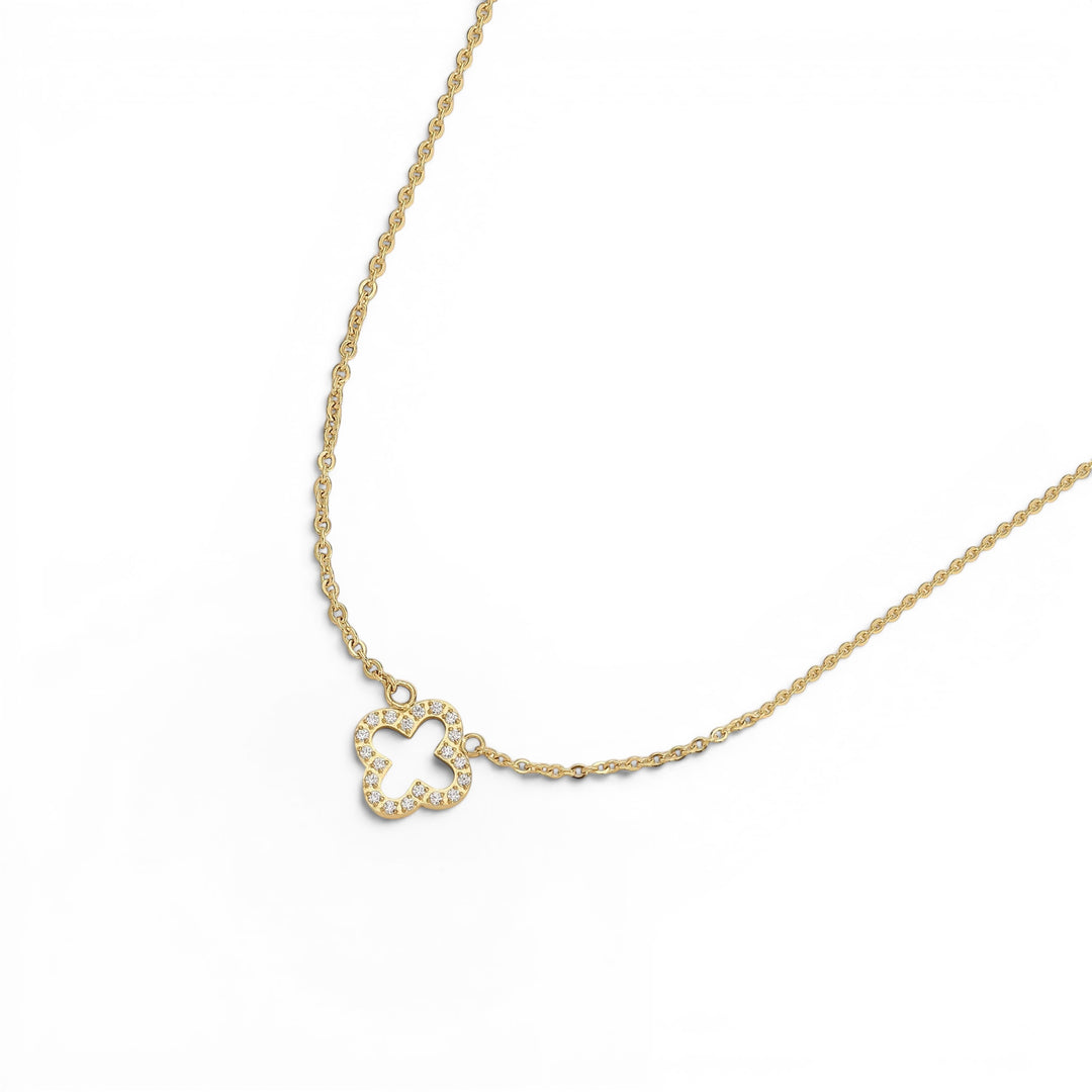 Niche Jewellery D.Louise gold clover pendant necklace with pavé crystal detailing on a delicate chain, waterproof design.