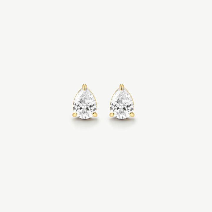 Niche Jewellery D.Louise gold stud earrings featuring a single pear-shaped solitaire stone for a timeless look.