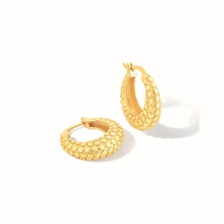 Niche Jewellery Formation Co Shore oval hoop earrings in 18k gold plated sterling silver with textured rock detail.
