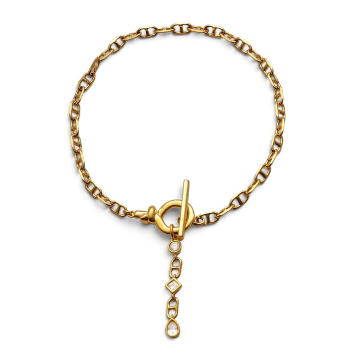 Niche Jewellery Katie Loxton gold-tone waterproof chain bracelet with a toggle clasp and dangling crystal charms.