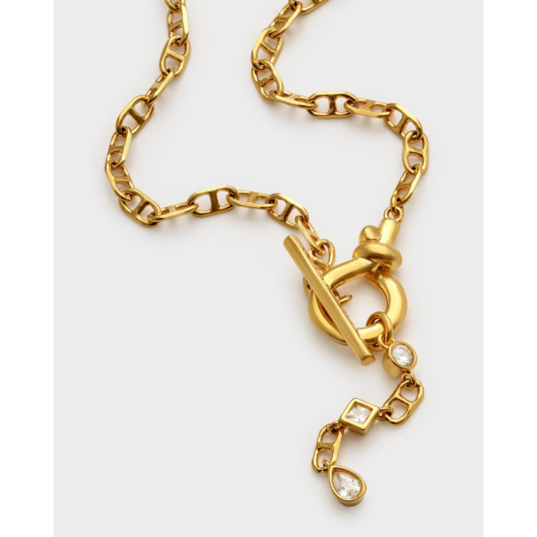Niche Jewellery Katie Loxton gold-tone waterproof chain bracelet with toggle clasp and sparkling crystal charms.