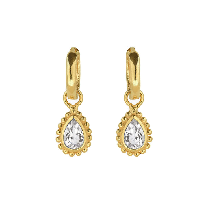 Niche Jewellery Charlotte's Web gold huggie hoops with pear-cut white topaz in a beaded Rawa style setting.