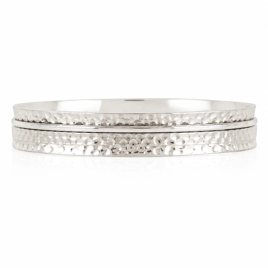 Niche Jewellery Charlotte's Web Karma Abundance spinning bangle in recycled hammered sterling silver.