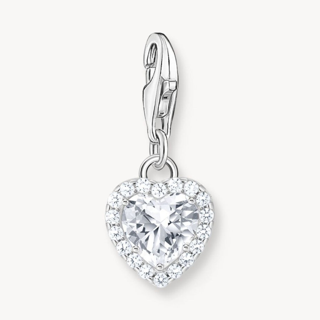 Niche Jewellery sterling silver heart charm pendant with a large central white zirconia surrounded by smaller stones.
