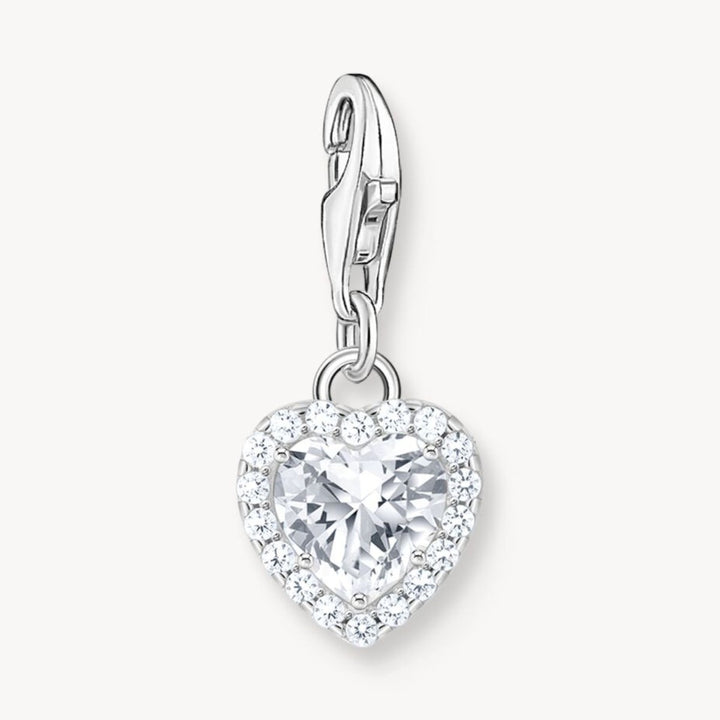 Niche Jewellery sterling silver heart charm pendant with a large central white zirconia surrounded by smaller stones.