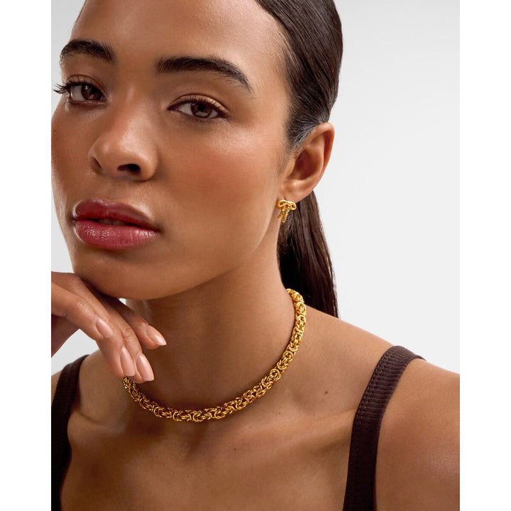 Niche Jewellery Katie Loxton Heritage waterproof gold Byzantine chain necklace worn by a woman