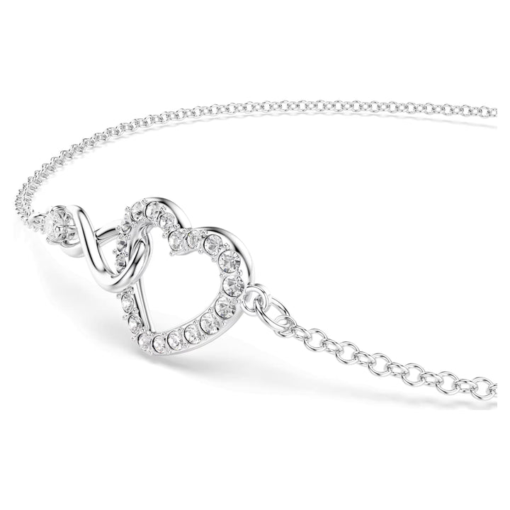 Niche Jewellery Swarovski Infinity Heart bracelet featuring white crystals on a rhodium-plated chain