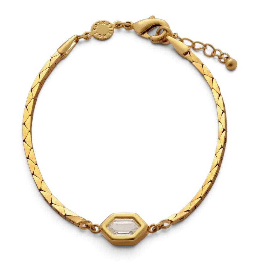 Niche Jewellery Katie Loxton gold-tone waterproof bracelet with diamond-check motif and central crystal charm.