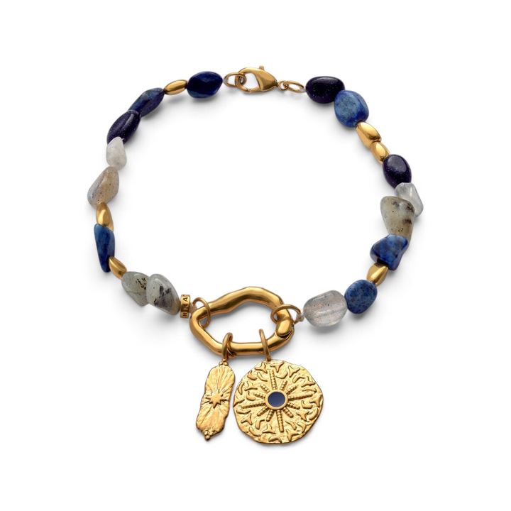 Niche Jewellery Katie Loxton gold waterproof bracelet featuring navy semi-precious stones and sunburst charms.