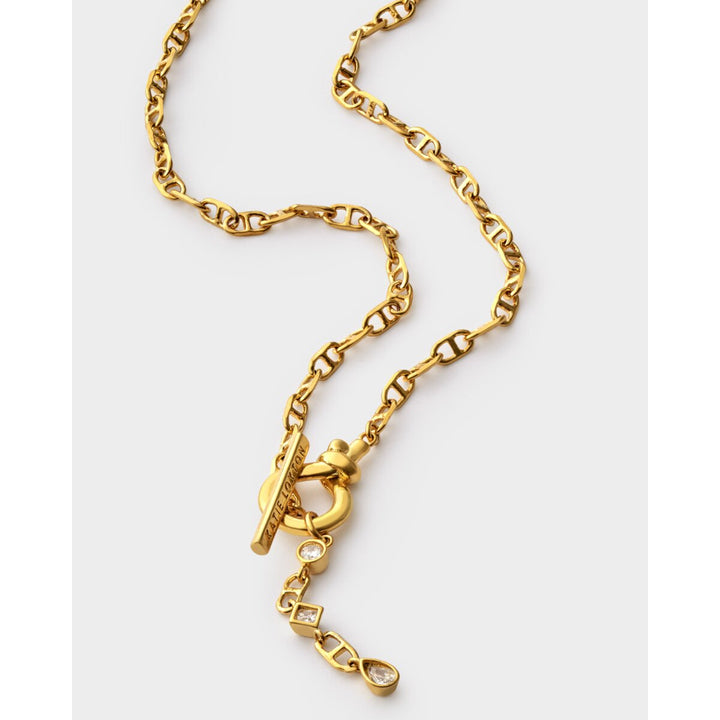 Niche Jewellery Katie Loxton gold-tone waterproof necklace with a toggle clasp and sparkling crystal pendants.