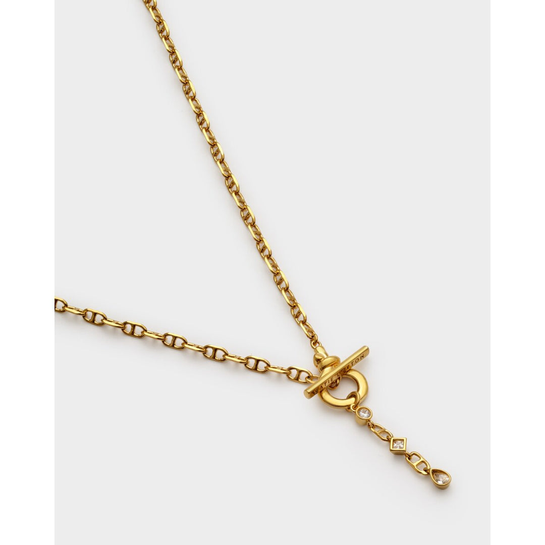Niche Jewellery Katie Loxton gold-tone waterproof necklace with a sparkling pendant and toggle clasp detail.