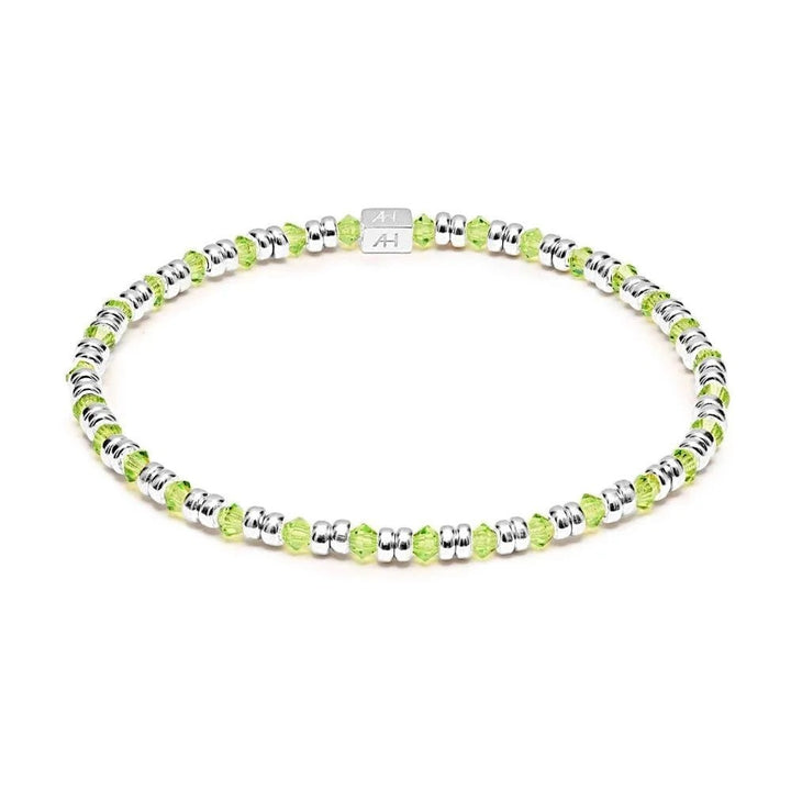 Niche Jewellery Annie Haak Joy bracelet featuring lime green crystals and 925 sterling silver beads on a stretch cord.