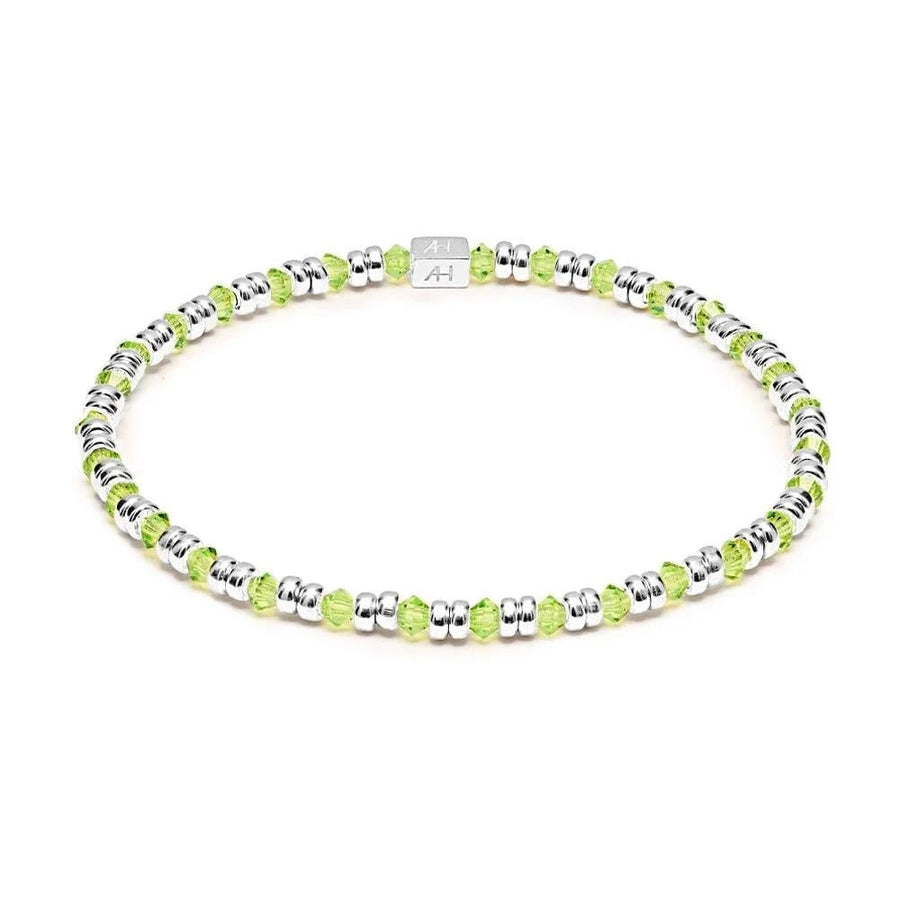 Niche Jewellery Annie Haak Joy bracelet featuring lime green crystals and 925 sterling silver beads on a stretch cord.
