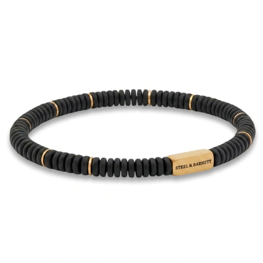 Niche Jewellery Steel & Barnett matte black onyx disc stretch bracelet with 18K gold-plated stainless steel accents.