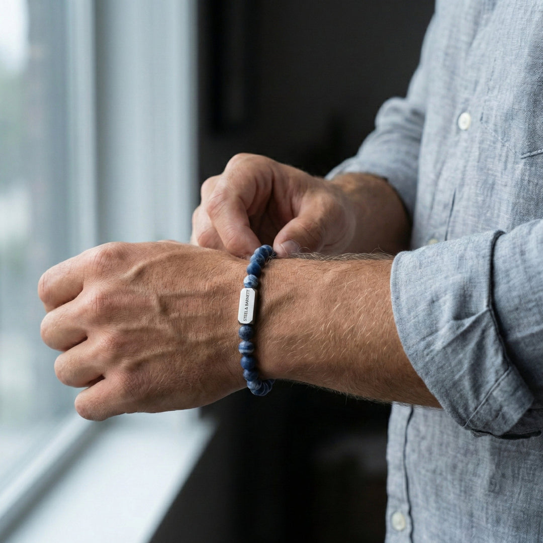 Niche Jewellery Steel & Barnett matte blue sodalite bead bracelet with stainless steel accent on a man's wrist