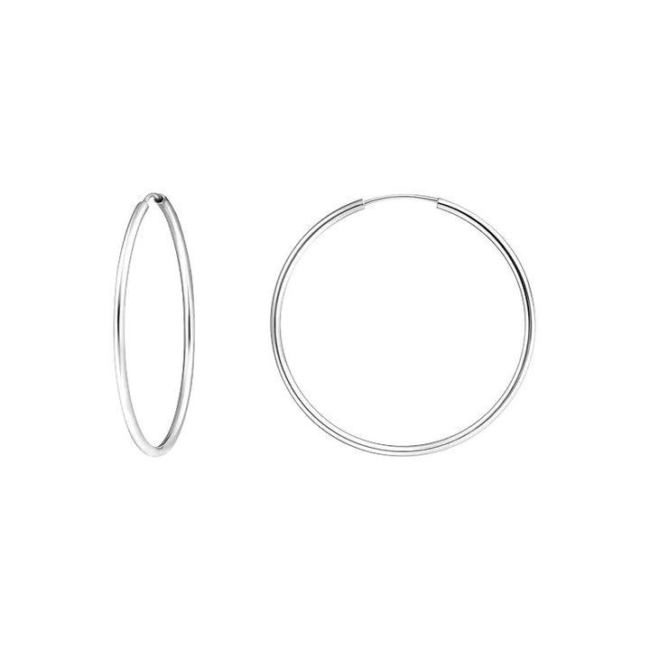 Niche Jewellery medium hoop earrings in polished recycled 925 sterling silver, 4cm diameter.