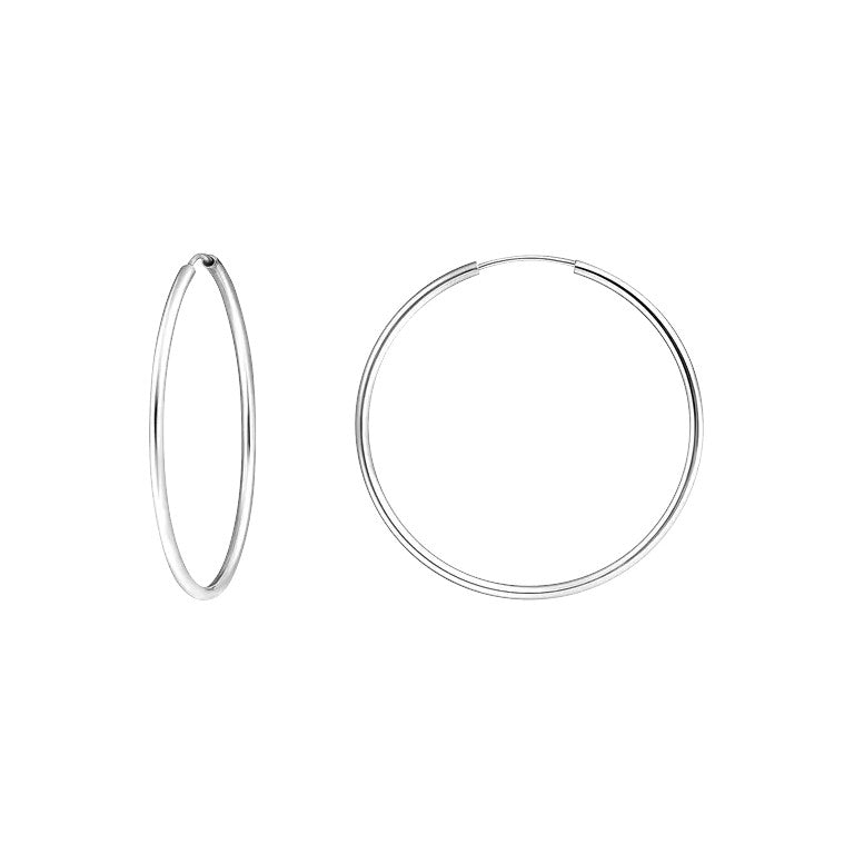Niche Jewellery medium hoop earrings in polished recycled 925 sterling silver, 4cm diameter.
