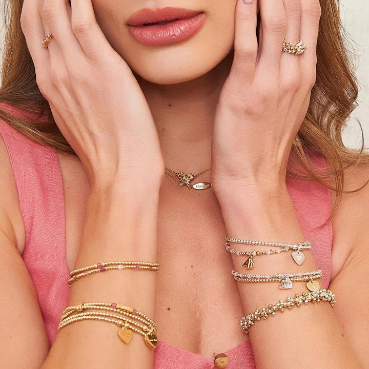 Niche Jewellery Annie Haak Gotri mixed metal bracelet with sterling silver and gold-plated bobble beads on a wrist.
