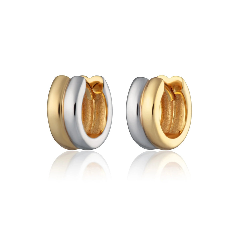 Niche Jewellery Scream Pretty mixed metal huggie earrings featuring a two-tone gold and silver finish.