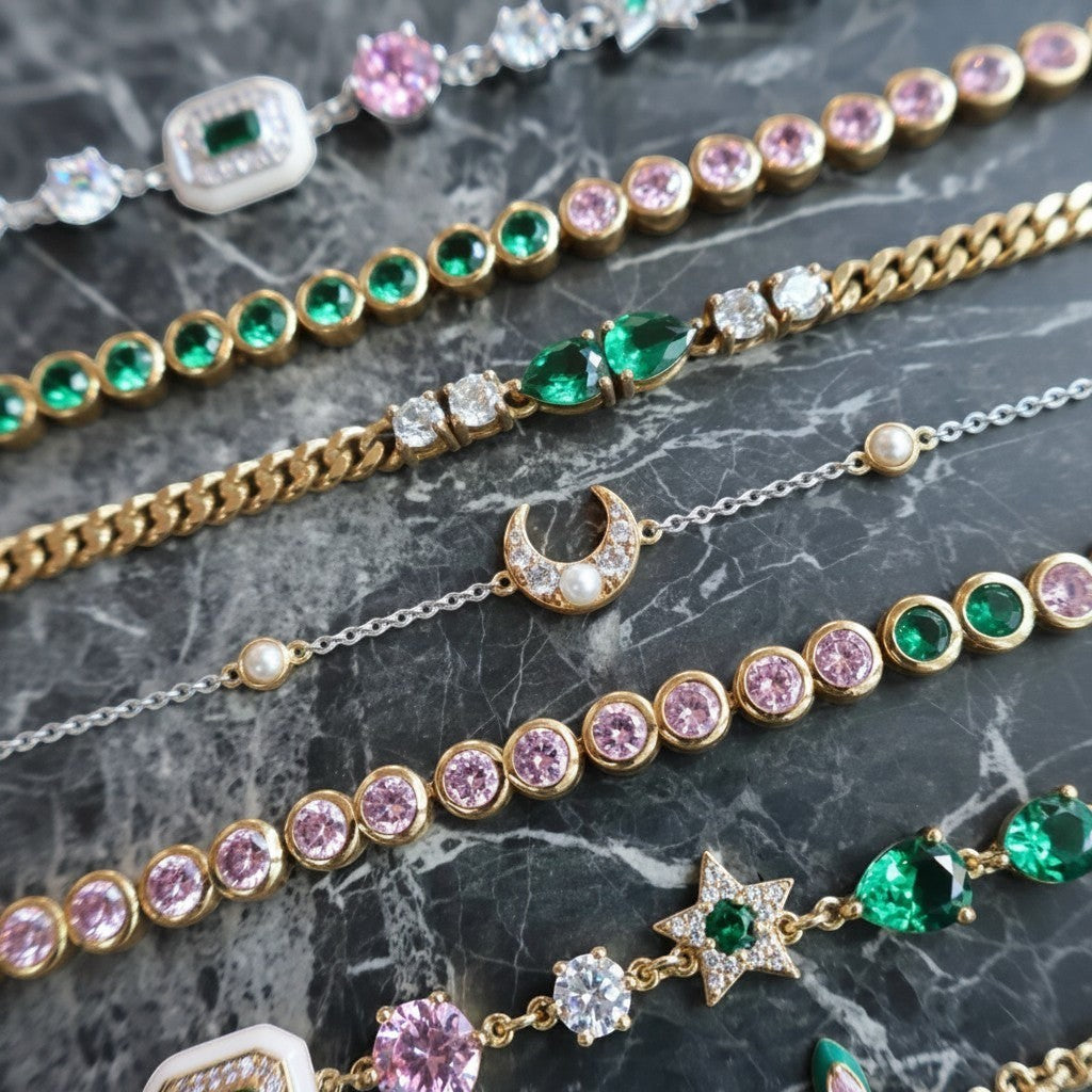 Niche Jewellery silver and gold chain bracelet with a moon and pearl charm, cubic zirconia accents.
