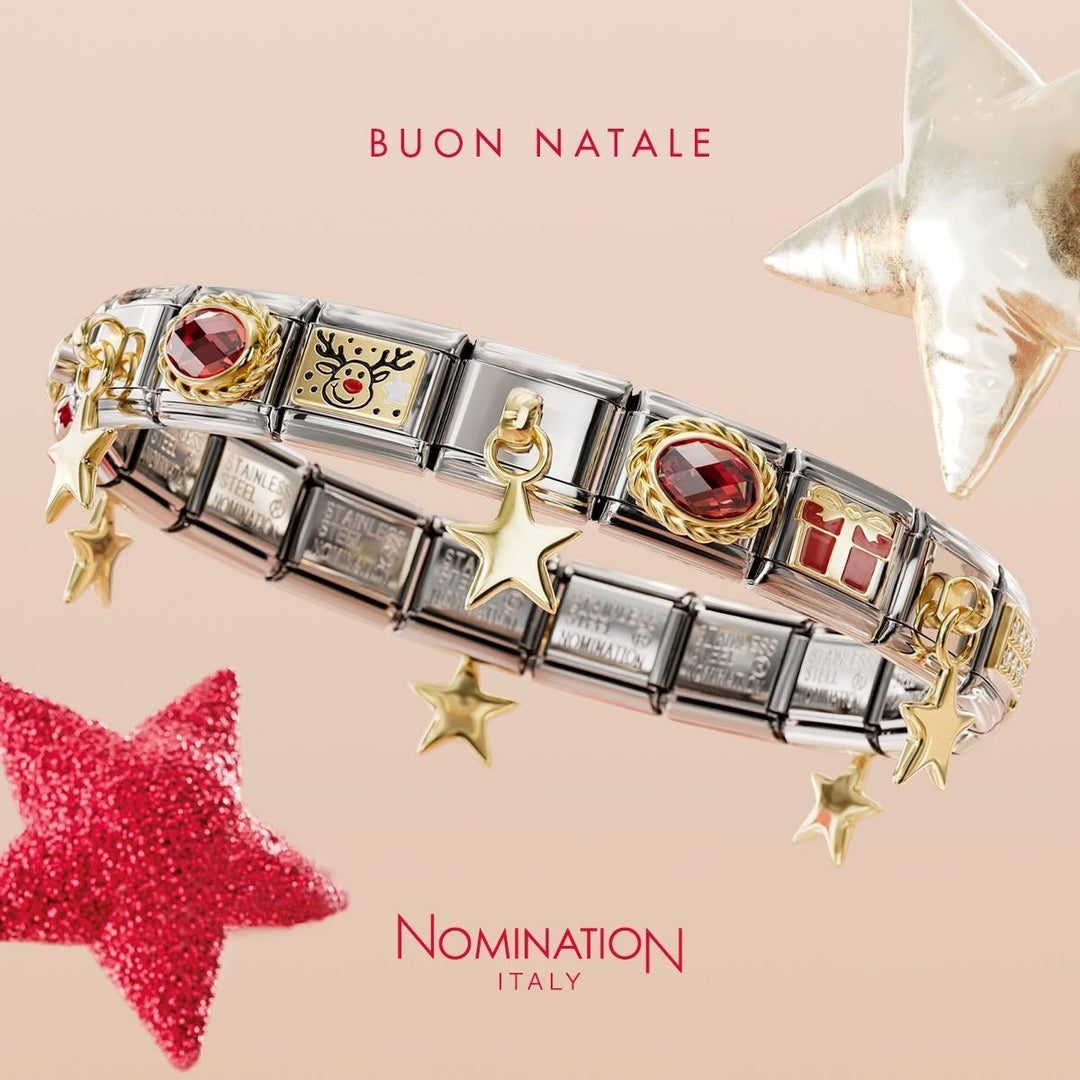 Niche Jewellery Nomination composable bracelet featuring a gingerbread man charm with pink enamel and festive accents.