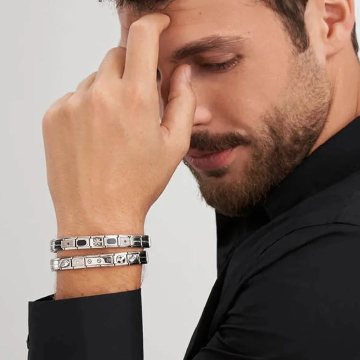 Niche Jewellery Nomination Composable Classic Dad charm in oxidised silver on a man's wrist bracelet