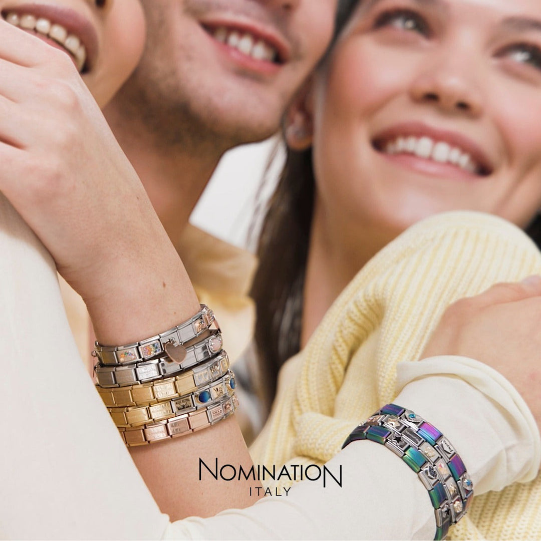 Niche Jewellery Nomination graduation charm featuring a gold and black enamel diploma on a classic link bracelet