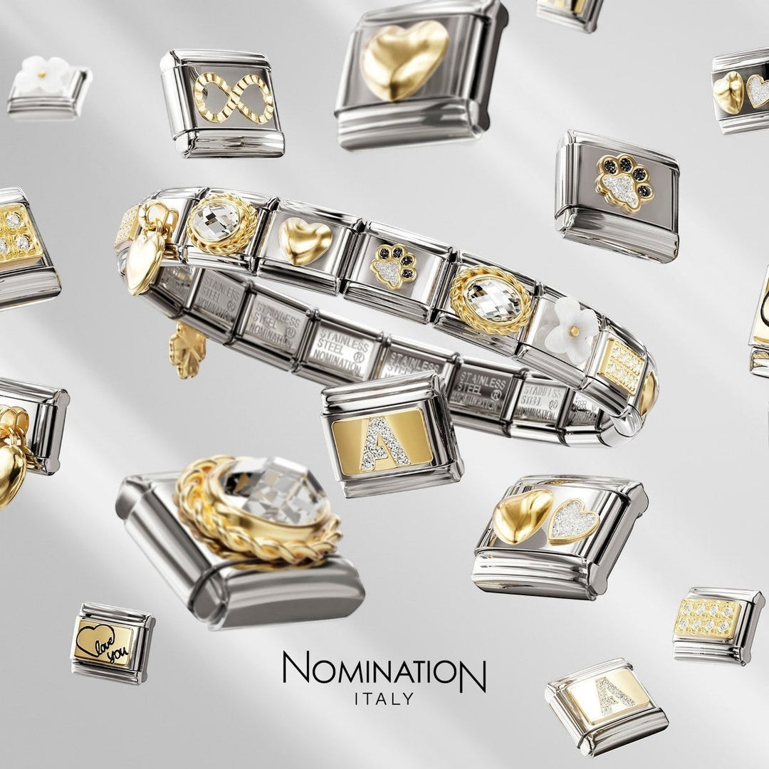 Niche Jewellery Nomination stainless steel charm bracelet with gold and silver glitter heart charms, letters, and crystals.