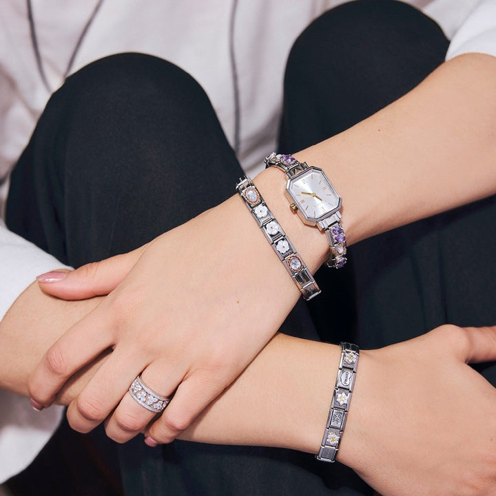 Niche Jewellery Nomination Paris rectangular watch with malachite green dial and gold accents on a composable bracelet