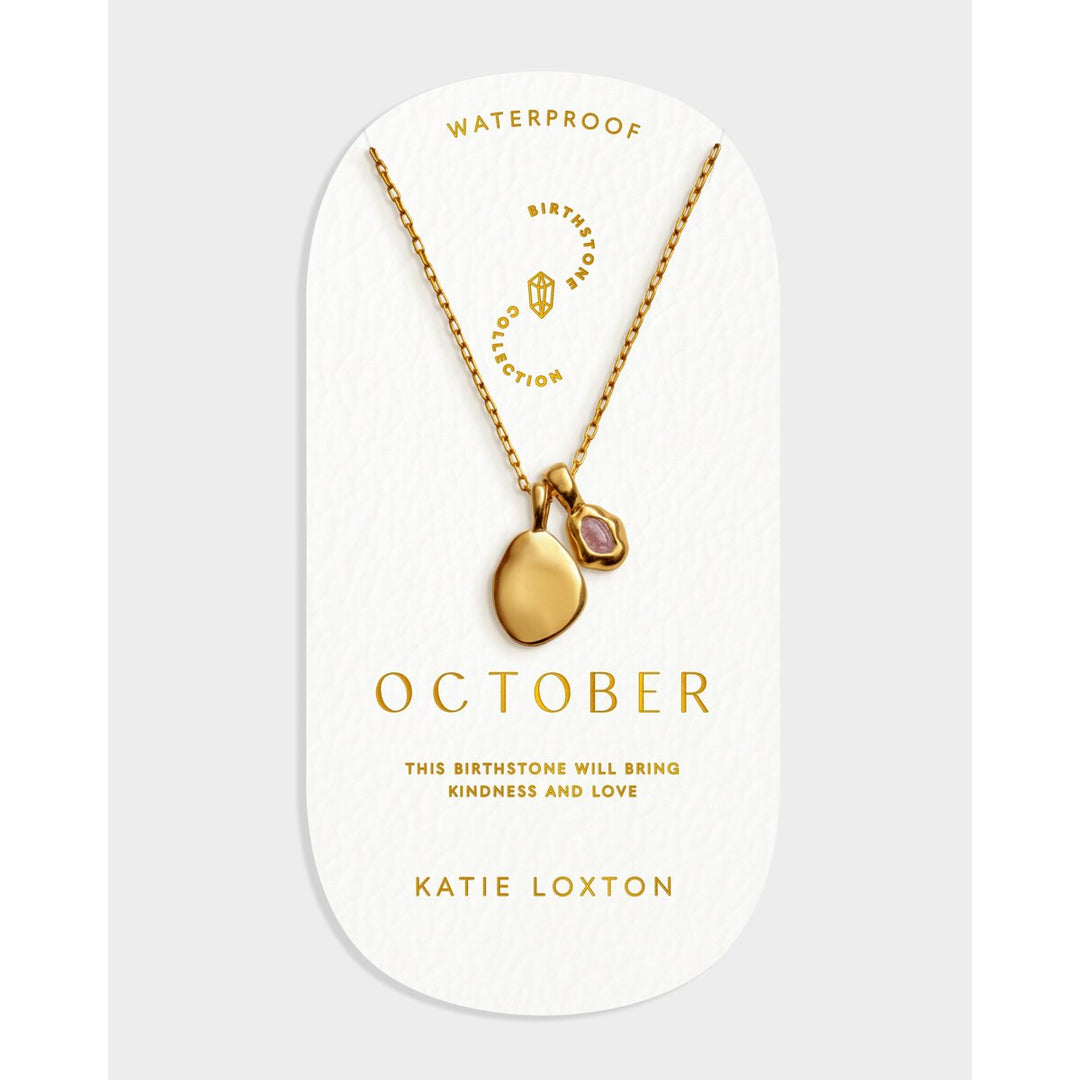 Niche Jewellery Katie Loxton gold waterproof necklace with a pink October birthstone pendant on a delicate chain.