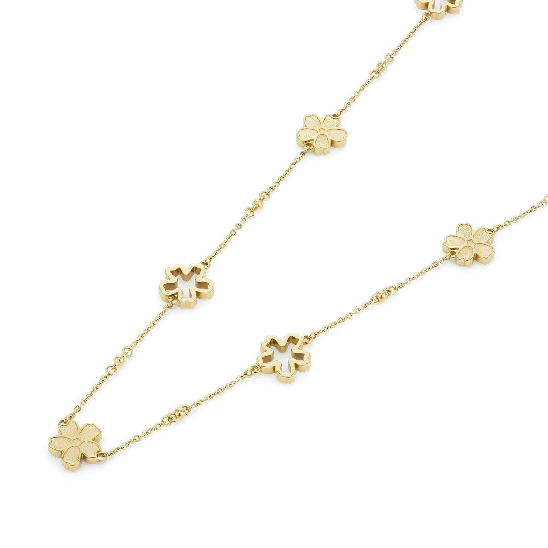 Niche Jewellery Olivia Burton gold-plated necklace featuring delicate forget-me-not flower charms on a fine chain.