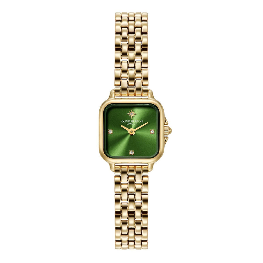 Niche Jewellery Olivia Burton Mini Grosvenor watch with a deep green dial, gold-tone bracelet, and crystal markers.