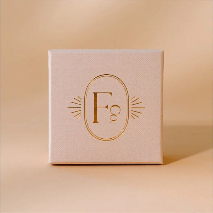 Niche Jewellery Formation Co branded square gift box in soft pink with gold foil logo for Formation Co Boheme Emerald Earrings