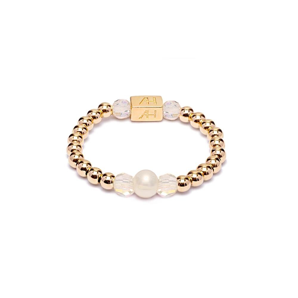 Niche Jewellery Annie Haak Poppy ring featuring gold-filled beads, a central pearl, and sparkling crystal accents.