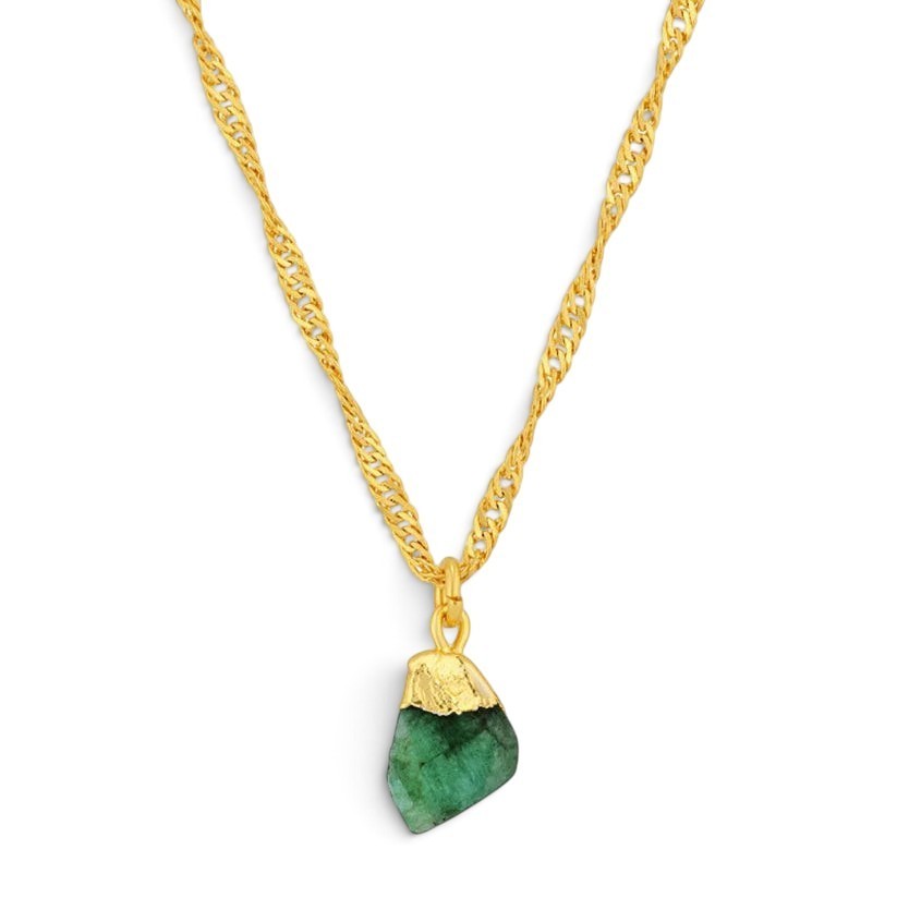 Niche Jewellery Formation Co Mohica necklace featuring a raw-cut emerald pendant on an 18k gold-plated twisted chain.