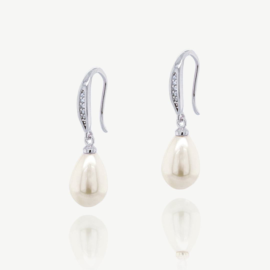 Niche Jewellery Ivory & Co Salford rhodium drop earrings featuring pave crystals and smooth ivory pearl drops.