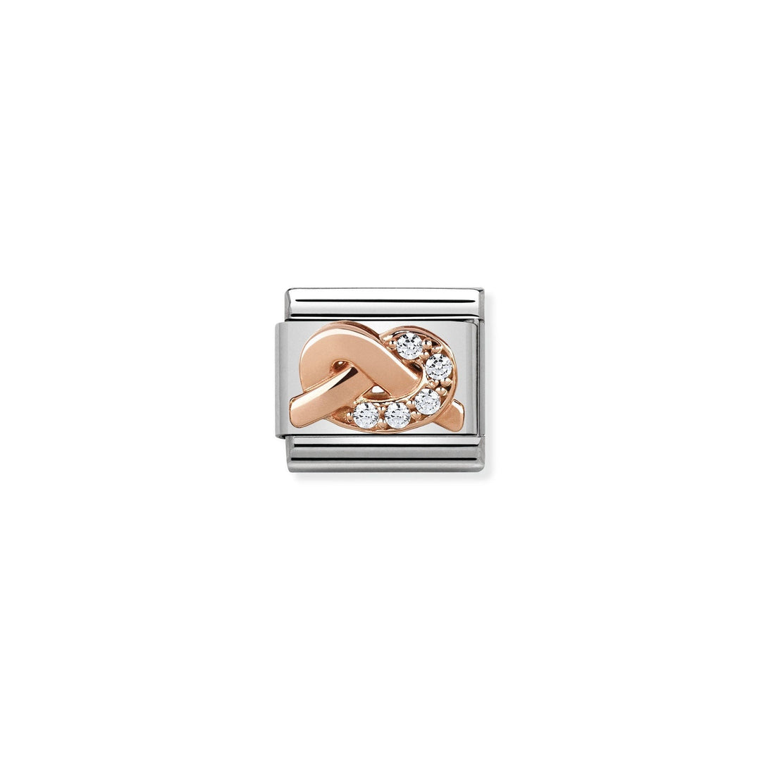 Niche Jewellery rose gold love knot charm with white cubic zirconia stones on a silver base.