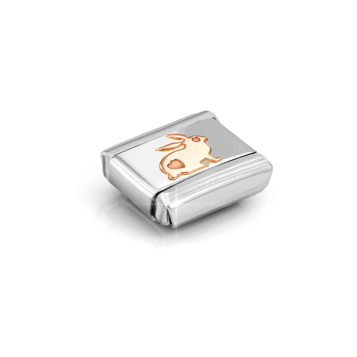 Niche Jewellery Nomination charm featuring a rose gold rabbit with a heart on a stainless steel link.
