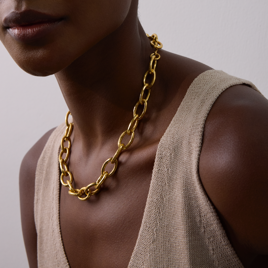 Niche Jewellery Shyla Tangier necklace featuring a chunky 22 carat gold-plated chain worn by a model.