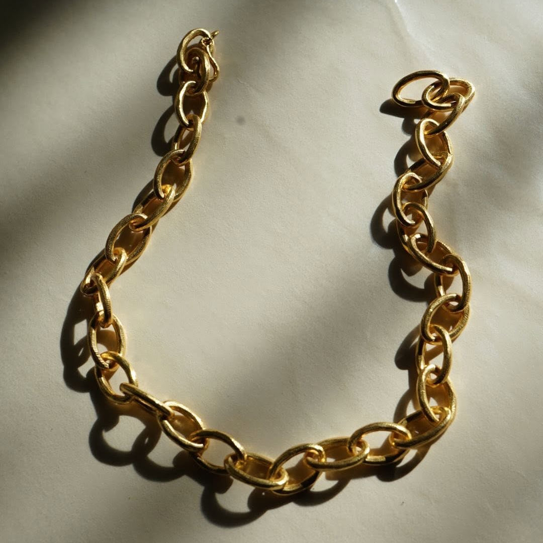 Niche Jewellery Shyla Tangier gold chunky chain necklace with textured links on a neutral background