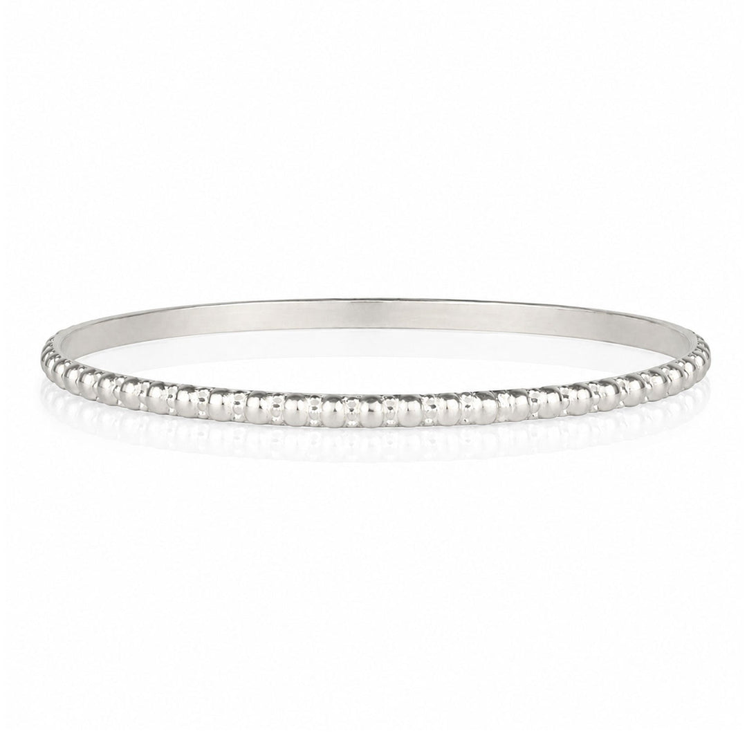 Niche Jewellery Charlotte's Web sterling silver Maharani stacking bangle with signature bubble detailing.